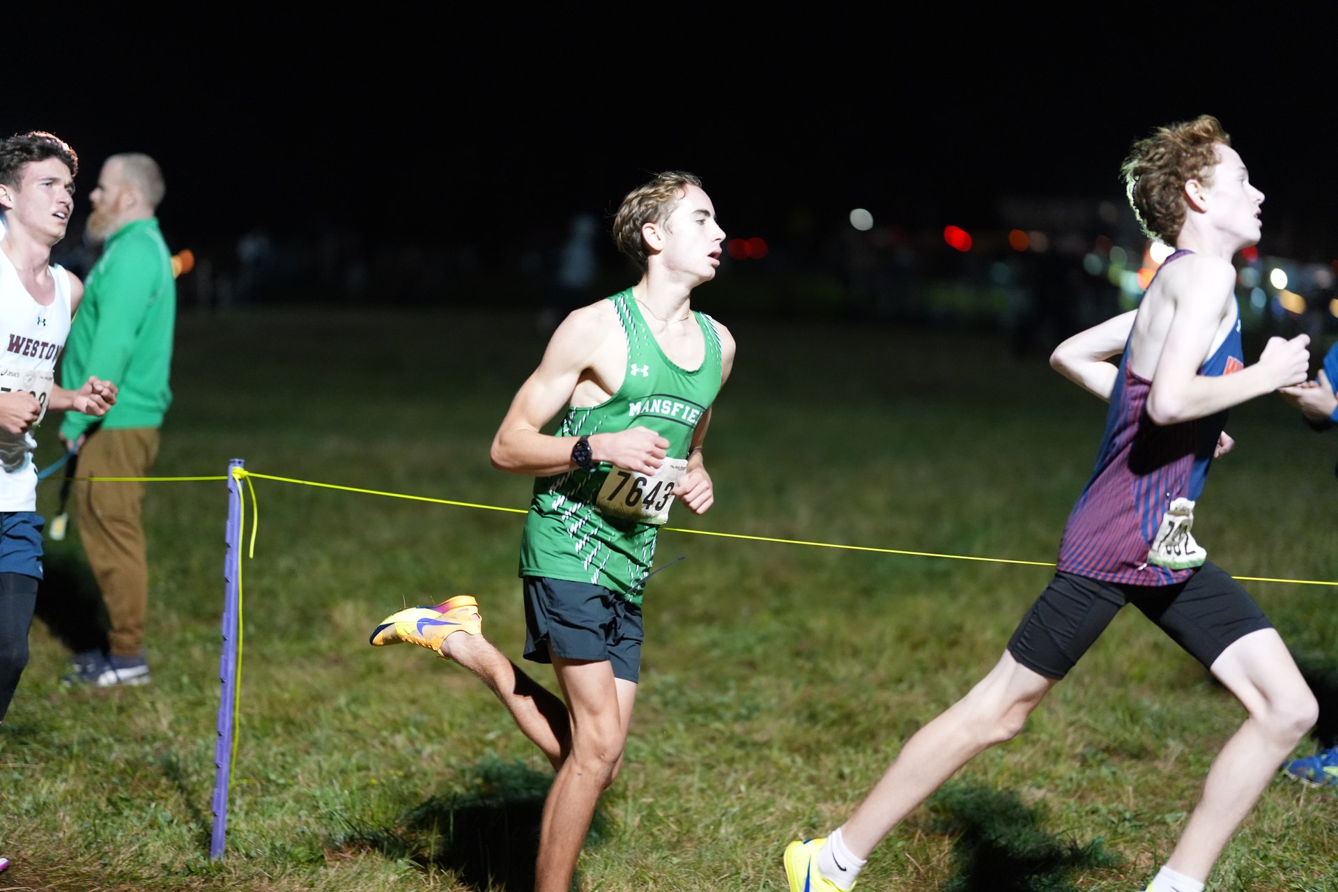 Bobby Stock follows the bend across the grass.