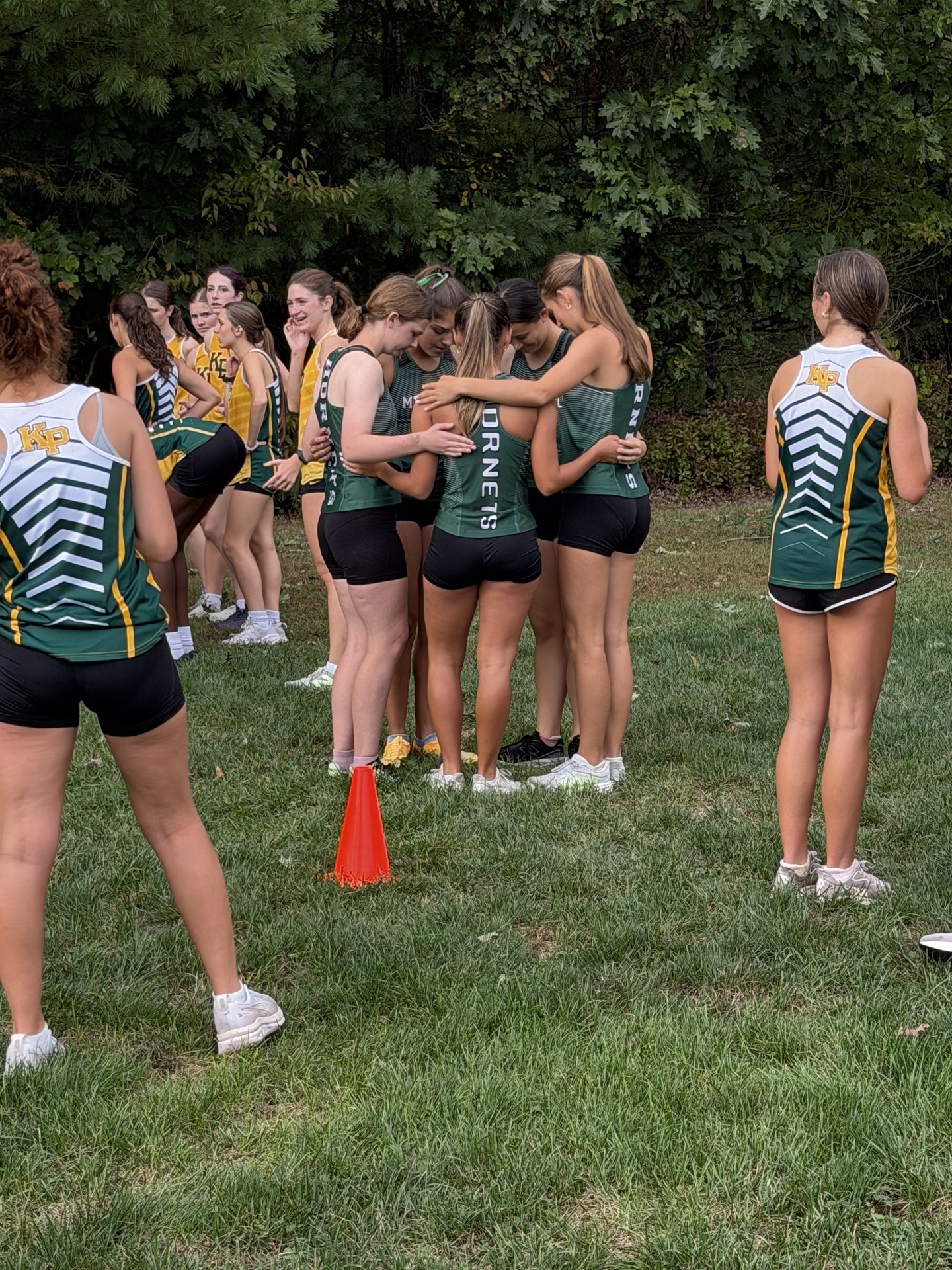 Mansfield’s girls drawing together before their varsity race.
