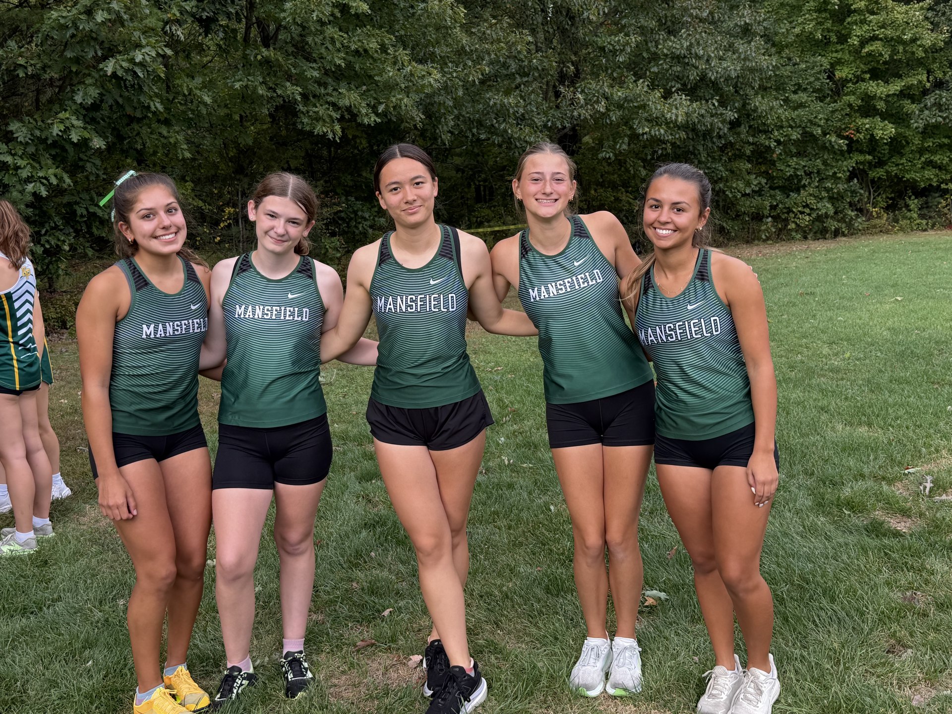 Mansfield’s girls varsity together before the start.