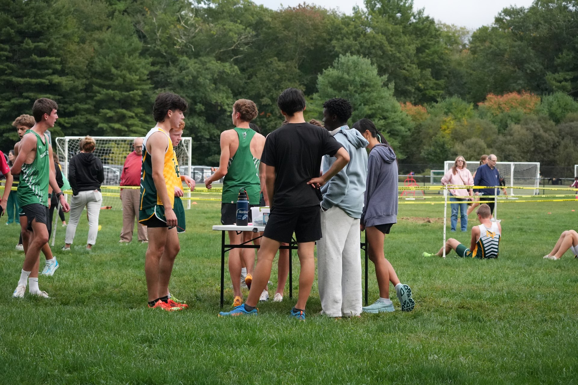 The runners together again after the boys varsity race.