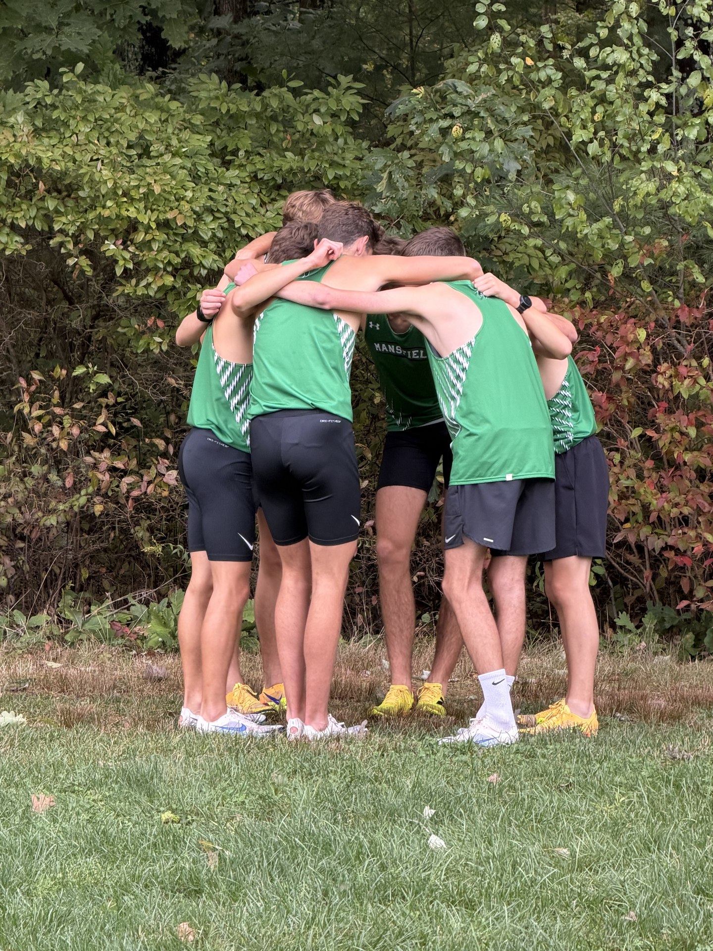 Mansfield’s boys in their huddle before the final race of the afternoon.